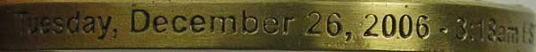 Geocoin edge engraving